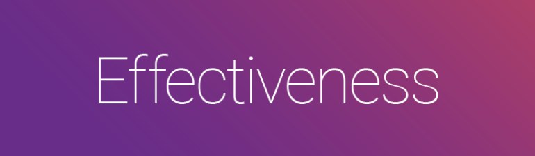 purple sign with word effectiveness printed on it