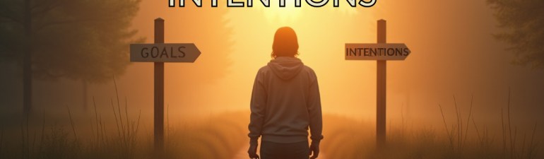 Person standing at a quiet crossroads at sunrise, holding a compass, symbolizing the difference between goal setting and intention.